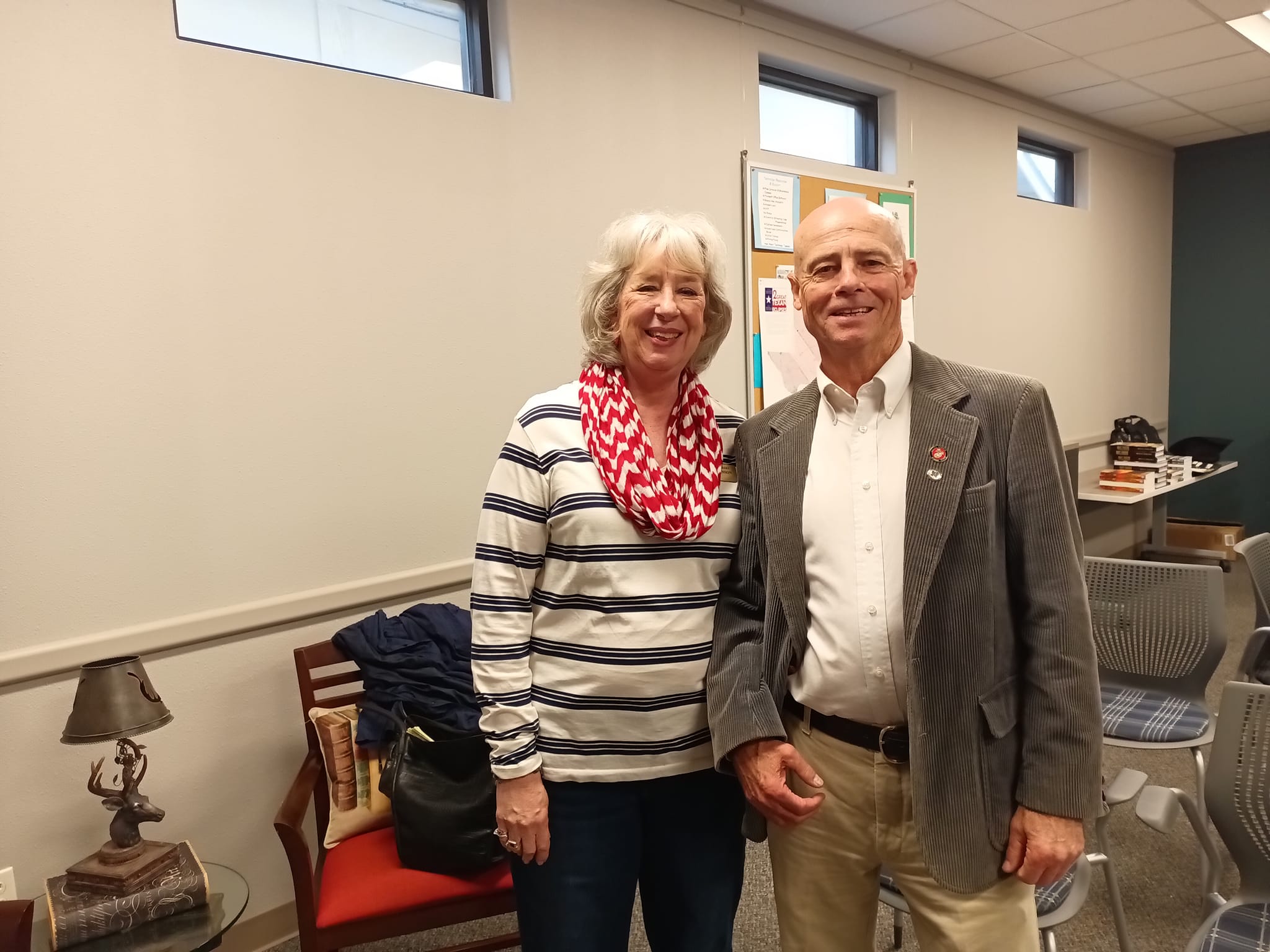 Author Ben H. English stands with woman who helped organize his book signing at the Comfort Public Library.